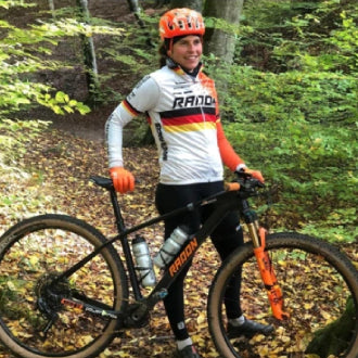 Elisabeth Brandeau and her mountain bike